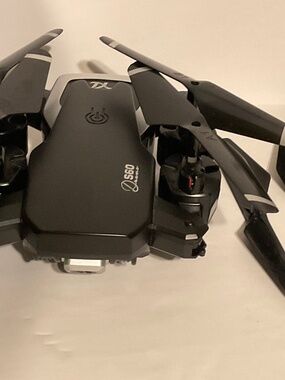 S60 TX Foldable Drone with Camera – 2.4GHz Remote Controller + Propeller Guards